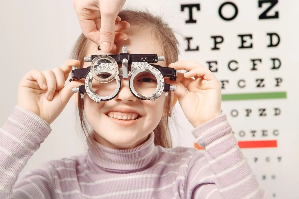 young girl undergoing an eye test