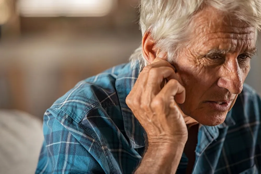 Man in pain with ear ache